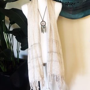 ASYMMETRICAL FRINGE IVORY VEST